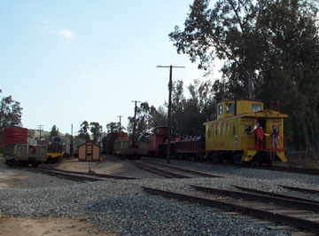 Visitor freight train passes the pie yard (Richard Boehle photo)