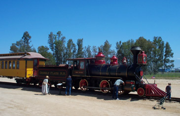 Visitors examine Grizzly Flats Locomotive and Coach (Richard Boehle photo)